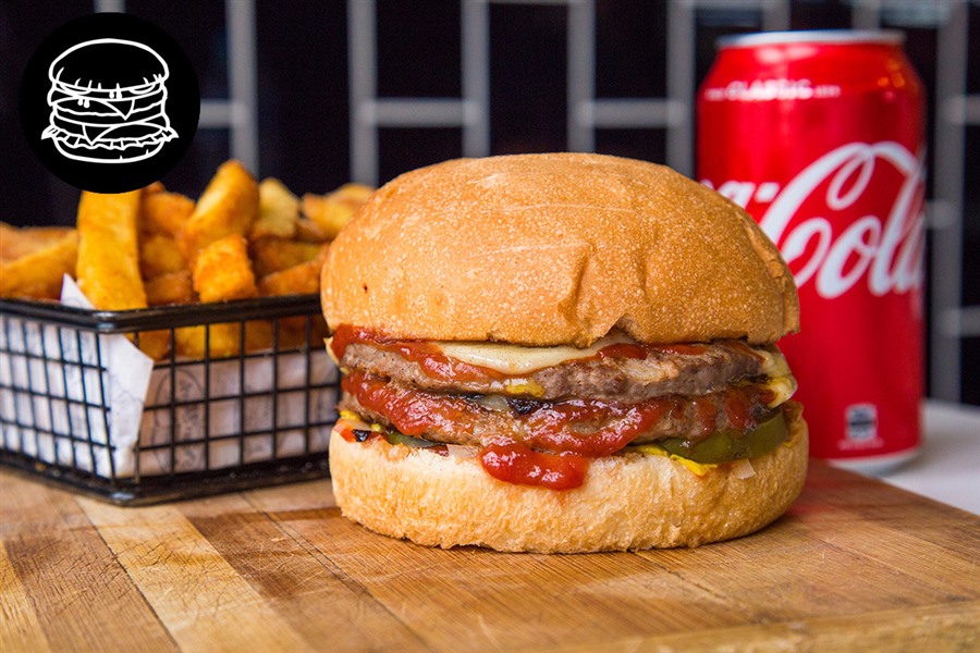 Tuck into a delicious American-style burger, side of chips and drink at New York Minute for JUST $10