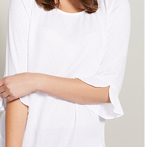 Dobby Ruffle Hem Top $79.95