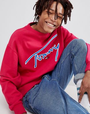 Tommy Jeans Signature Capsule logo front sweatshirt relaxed fit in bright pink $135.00