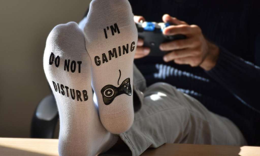 “Do Not Disturb I’m Gaming” Socks: Two ($9.95) or Four Pairs ($17)