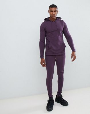 ASOS DESIGN tracksuit muscle hoodie/extreme super skinny joggers in dark purple $38.00