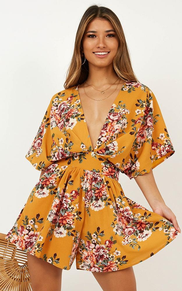 Lost In The Wind Playsuit In Mango Floral US$53.95