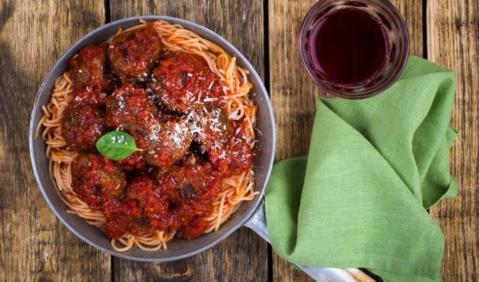 Pasta Dish with Wine for Two ($39) or Four People ($75) at Capriccio Osteria e Bar (Up to $172 Value)