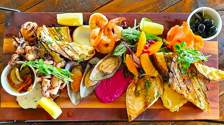 Have a Seafood Platter and Bottle of House Wine for Two People at $69!