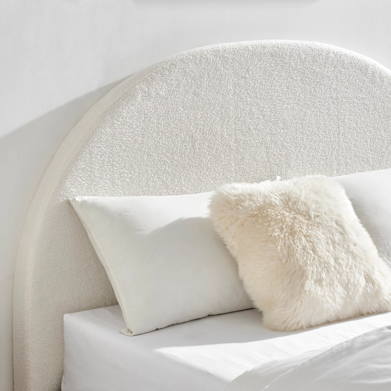 Bring some flair to your bedroom with a luxurious DukeLiving Georgia Ivory Boucle Arch Bedhead for $239!